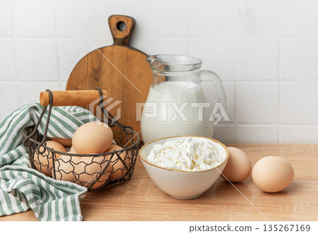 Fresh raw dairy products preparing healthy breakfast Fresh raw dairy products preparing healthy breakfast 135267169