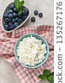Cottage cheese and blueberries for healthy breakfast 135267176