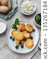 Syrniki cottage cheese pancakes with fresh blueberries and mint breakfast 135267184