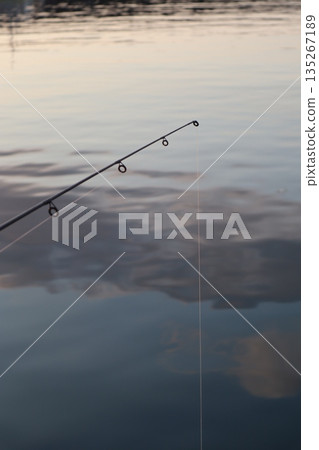 Fishing rods dyed in the sunset Fishing rods dyed in the sunset 135267189