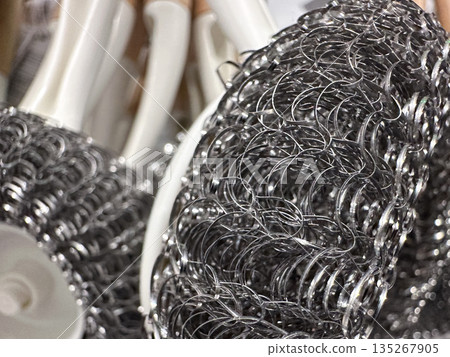 Close-up of steel wool scrubbing pads for cleaning and scouring. 135267905