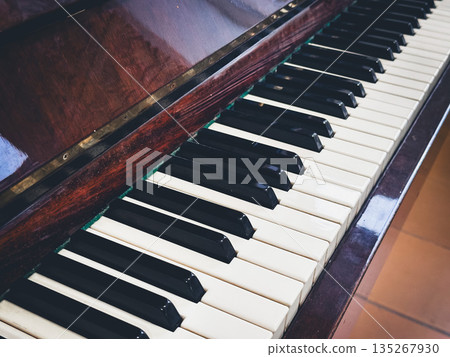 Elegant piano keys in close-up, highlighting the classic design. 135267930