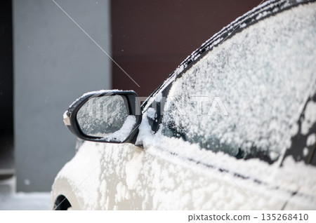 Snow Covered Car Side Mirror Detail Snow Covered Car Side Mirror Detail 135268410