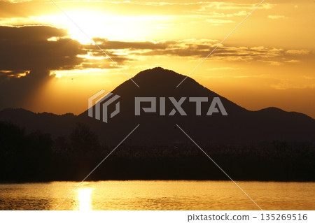 Mount Mikami at sunrise as seen from Lake Kihamauchi Mount Mikami at sunrise as seen from Lake Kihamauchi 135269516