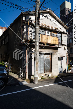 Japanese two-story old house, wooden building in need of renovation, 135269722