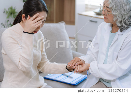 Female patient receiving therapy for depression and stress in a psychiatric clinic. Female patient receiving therapy for depression and stress in a psychiatric clinic. 135270254