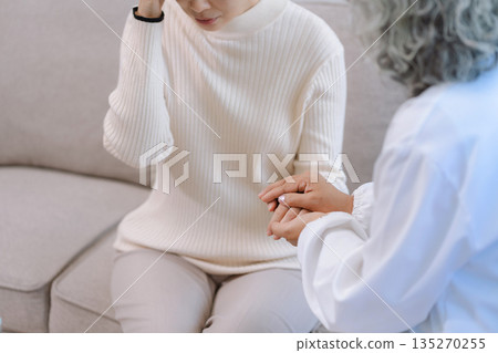 Female patient receiving therapy for depression and stress in a psychiatric clinic. Female patient receiving therapy for depression and stress in a psychiatric clinic. 135270255