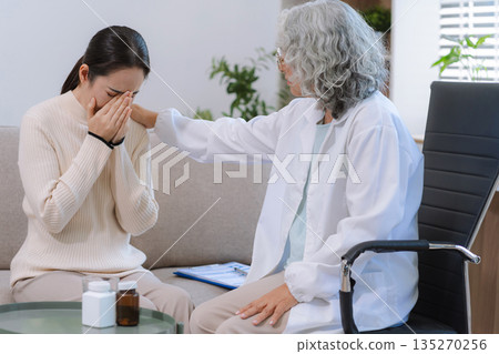 Female patient receiving therapy for depression and stress in a psychiatric clinic. Female patient receiving therapy for depression and stress in a psychiatric clinic. 135270256