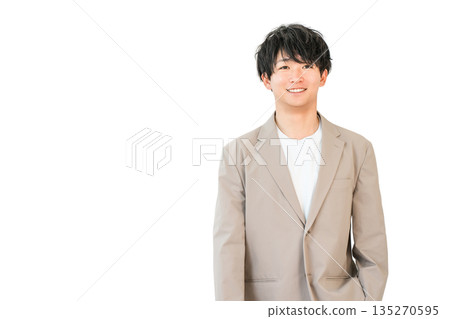 Smiling young Asian businessman in a suit or jacket (office casual, refreshing, job change, employment) Smiling young Asian businessman in a suit or jacket (office casual, refreshing, job change, employment) 135270595