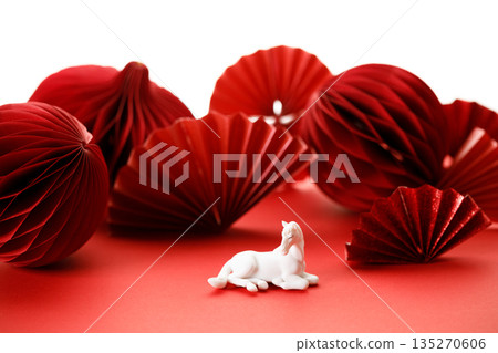 A festive Chinese New Year background with red paper fans. 135270606