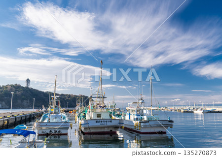 View of Katase Fishing Port overlooking Enoshima, Kanagawa Prefecture 135270873