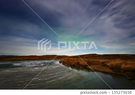 Aurora swallowed by clouds 135273036