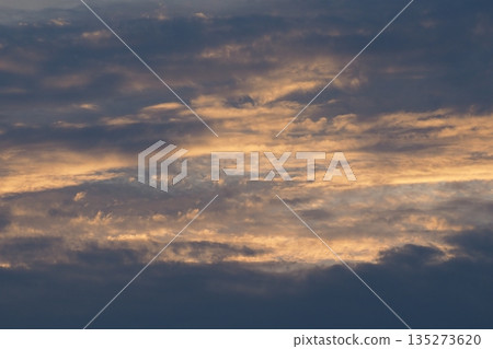 sunset seen through clouds sunset seen through clouds 135273620