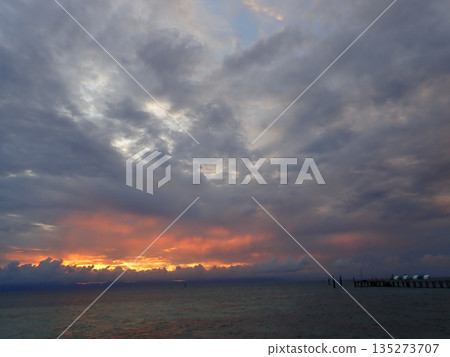 The sun setting over Cairns 135273707