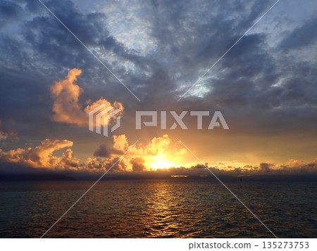 The sun setting over Cairns The sun setting over Cairns 135273753