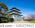 The castle tower shines against the blue spring sky 135273915