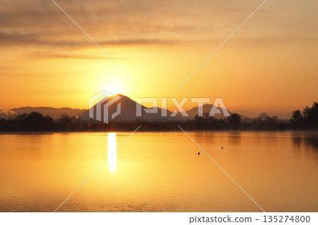 Mount Mikami at sunrise as seen from Lake Kihamauchi Mount Mikami at sunrise as seen from Lake Kihamauchi 135274800