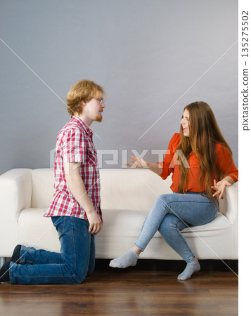 Man begging for forgiveness his woman 135275502