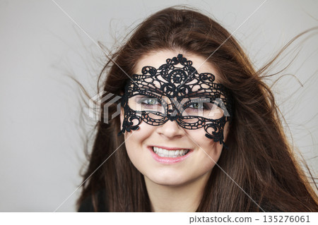 Mysterious woman wearing lace mask Mysterious woman wearing lace mask 135276061