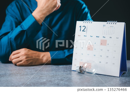 Job search light bulb hire career college recruitment business contemporary opportunity concept, creative employment recruiting person sits by desk calendar planning future 135276466