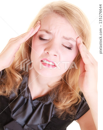 Headache. Woman suffering from head pain isolated. Headache. Woman suffering from head pain isolated. 135276644