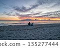 sunrise romantic couple on Corsican coast near Bastia Etang de Biguglia Camping San Daminao Beachside Corse 135277444