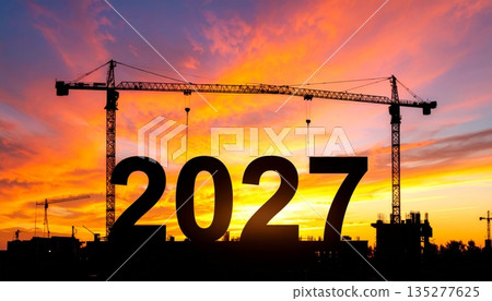 A silhouette of industrial cranes at a construction site against a yellow sunset sky illustrates a concept of urban building development and engineering architecture 2027 A silhouette of industrial cranes at a construction site against a yellow sunset sky illustrates a concept of urban building development and engineering architecture 2027 135277625