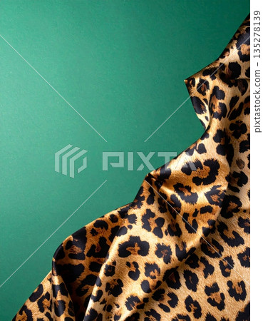 A close-up of a tall giraffe in a zoo highlights the beautiful brown spots and unique fur pattern of the mammal's long neck and head during a wildlife safari 135278139
