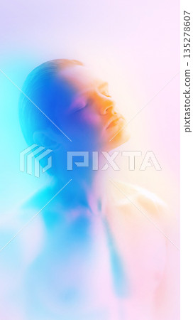 Soft focus male beauty portrait with pastel color lighting. Soft focus male beauty portrait with pastel color lighting. 135278607