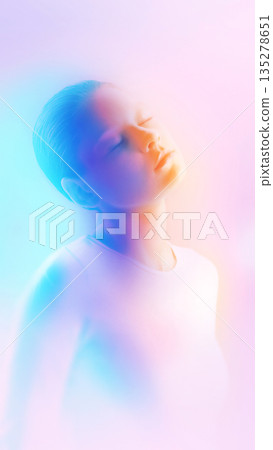 Abstract female portrait with tilted head in soft pastel lighting. Abstract female portrait with tilted head in soft pastel lighting. 135278651