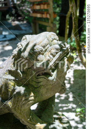 Stone komainu statue at Mitaki-Dera temple in Hiroshima, Japan 135278695