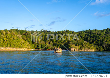 Lia beach at sunset, Waleakodi Island, Togian archipelago, Sulawesi, Indonesia Lia beach at sunset, Waleakodi Island, Togian archipelago, Sulawesi, Indonesia 135278721