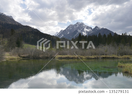 Alpine lake reflection of Ponce mountainsAlpine lake reflection of Ponce mountains 135279131