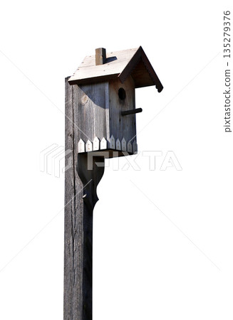Hand-made wooden birdhouse. Concept of welcoming ambiance for feathered friends. Home or gardening decor, nature-themed project. Wood nesting box. Isolated on white background 135279376
