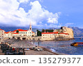 Old town, fortress wall and Adriatic sea, Budva, Montenegro. Beautiful scene with medieval houses and seascape. Topic of summer vacation, travel, cruises, tour 135279377