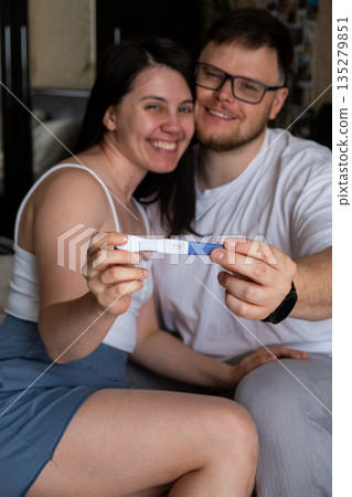 Happy Couple Celebrating Positive Pregnancy Test Happy Couple Celebrating Positive Pregnancy Test 135279851