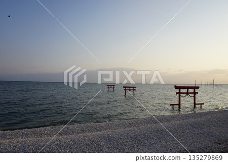 Ariake Sea Underwater torii gate at high tide Ariake Sea Underwater torii gate at high tide 135279869
