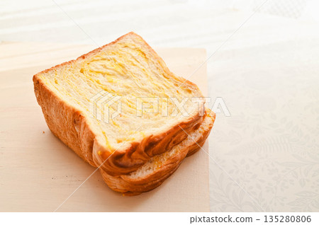 Thick-sliced orange bread 135280806