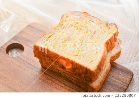 Thick-sliced orange bread 135280807