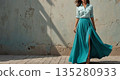 Woman in blue dress 135280933