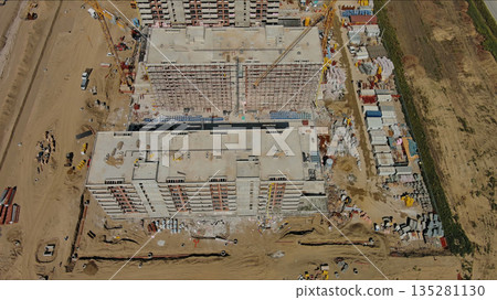 Industrial construction site with construction equipment and materials 135281130