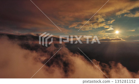 Aerial view of orange fluffy cloud in sky 135281152