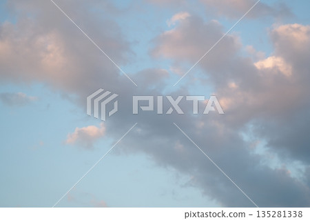Clouds illuminated by the sunset 135281338