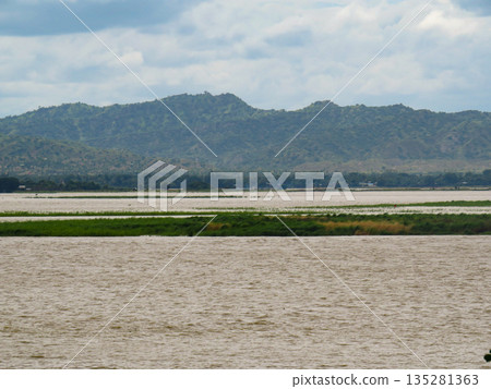 The Irrawaddy River and Mountains in Myanmar The Irrawaddy River and Mountains in Myanmar 135281363