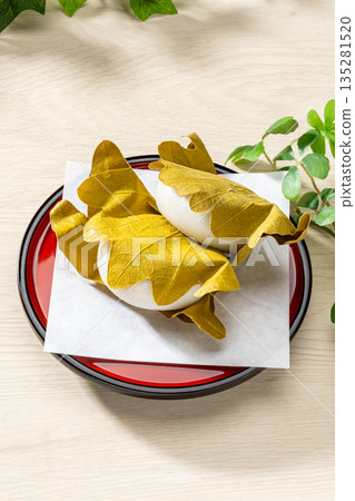 Kashiwamochi, a traditional Japanese sweet for Children's Day Kashiwamochi, a traditional Japanese sweet for Children's Day 135281520