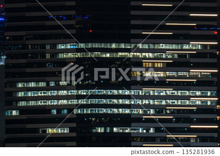 High-rise apartments at night, tower apartments, densely packed apartment buildings along Tokyo Bay 135281936
