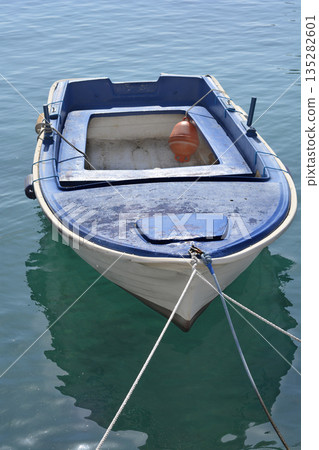 Blue and white rowboat Blue and white rowboat 135282601