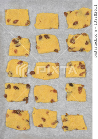Unbaked zaletti cookies with raisins Unbaked zaletti cookies with raisins 135282611