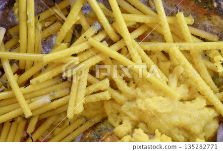 Yellow Candles Burnt in Buddhist Offering Tray Yellow Candles Burnt in Buddhist Offering Tray 135282771