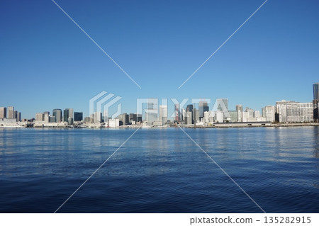 Tokyo Tower and the skyscrapers of Minato Ward across Tokyo Bay Tokyo Tower and the skyscrapers of Minato Ward across Tokyo Bay 135282915